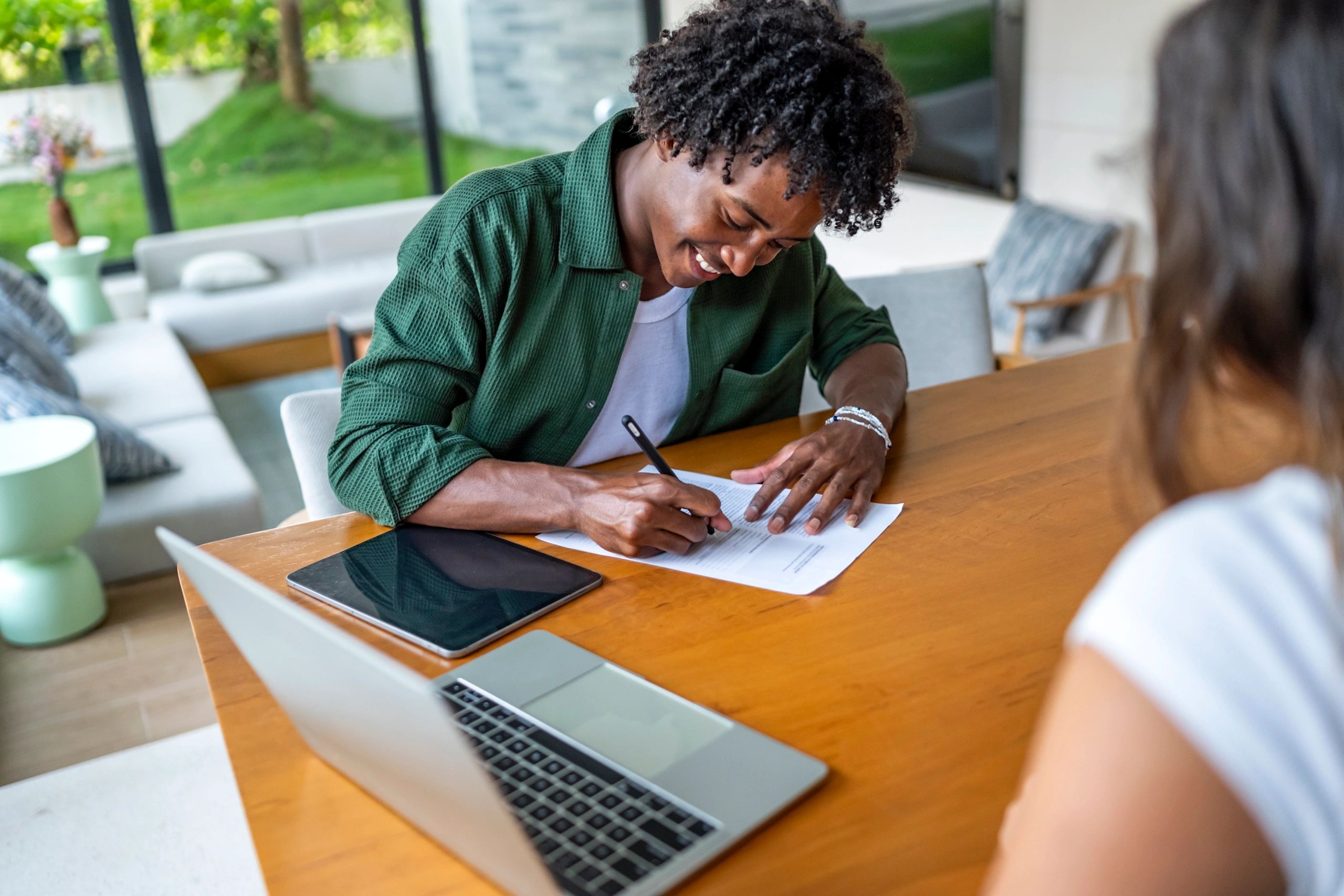 Client signing documents during a professional notary appointment